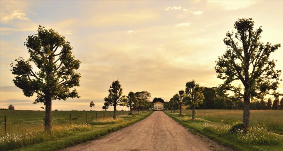 clouds country countryside dirt road